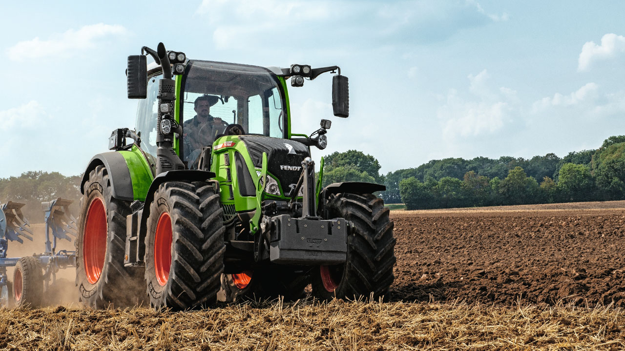 Fendt 500 Vario tractor working in tilled field, highlighting AGCO precision farming and planting equipment.