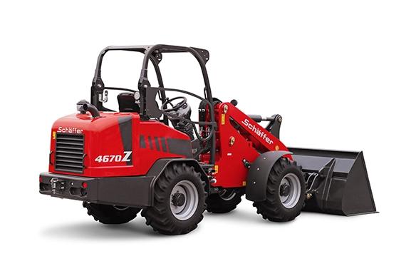 Rear angle view of Schäffer 4670Z wheel loader, highlighting its robust frame and maneuverability for agricultural and industrial use.
