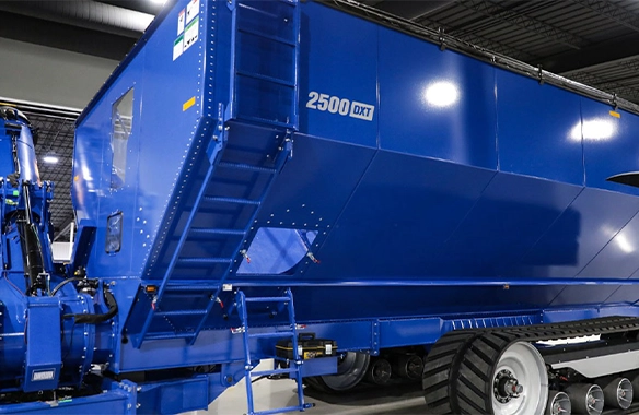 Brandt 2500 DXT grain cart on tracks, providing high-volume capacity and reduced soil compaction for large-scale operations.