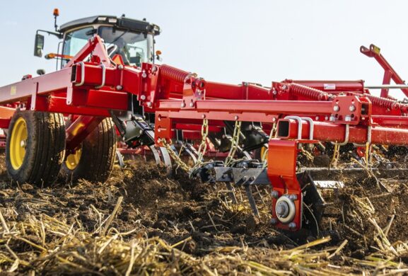 Tillage equipment moving through a field