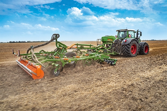 Rear view of Ceus 6000-2TX Ultra in operation with dust clouds forming during tillage.