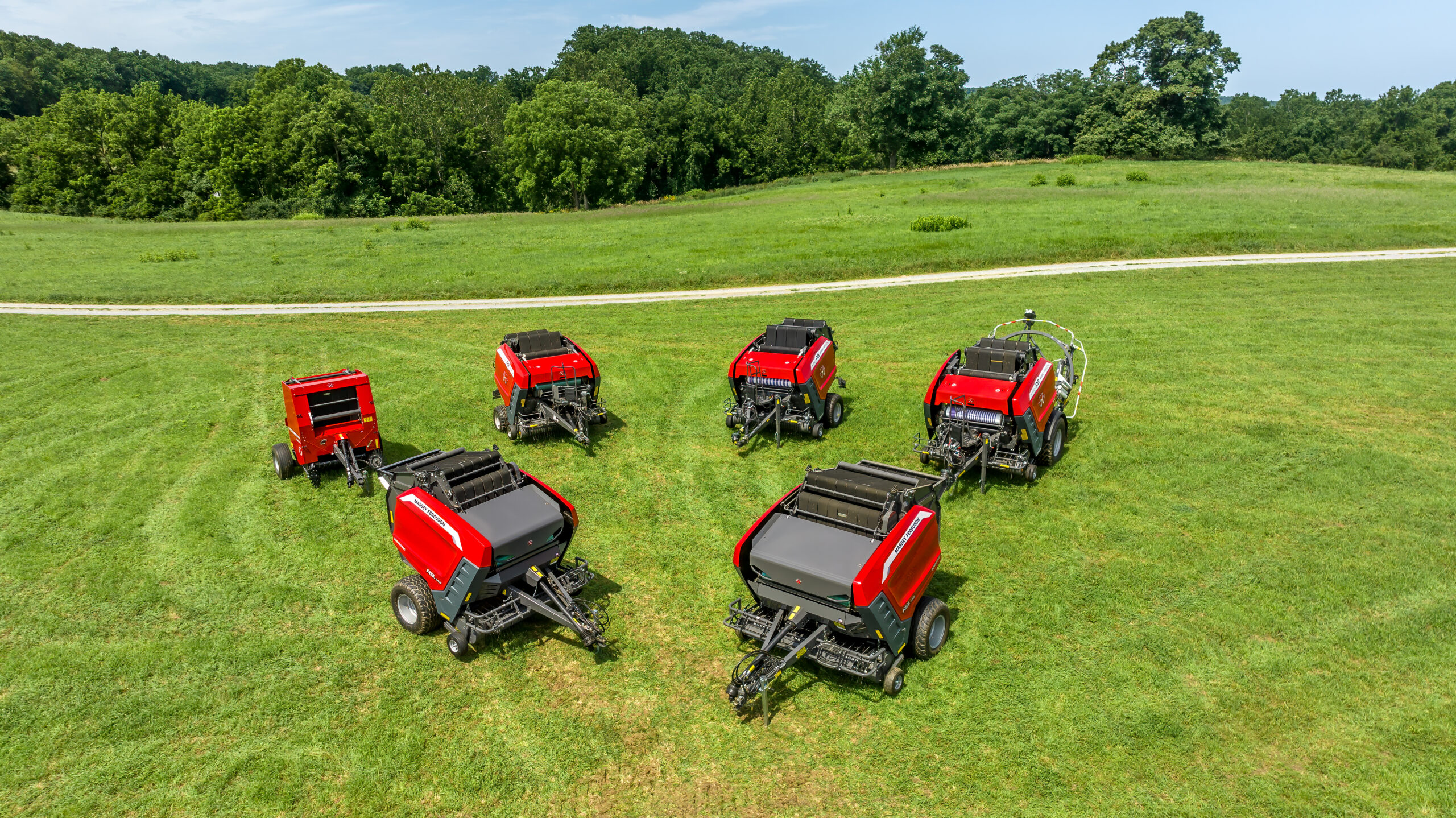 Massey Ferguson balers on display in a field